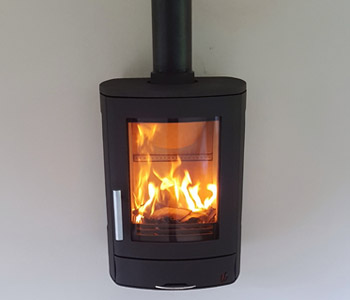 ACR Neo 3W Multifuel Stove - in black with a honed granite hearth. Installed in Guildford, Surrey